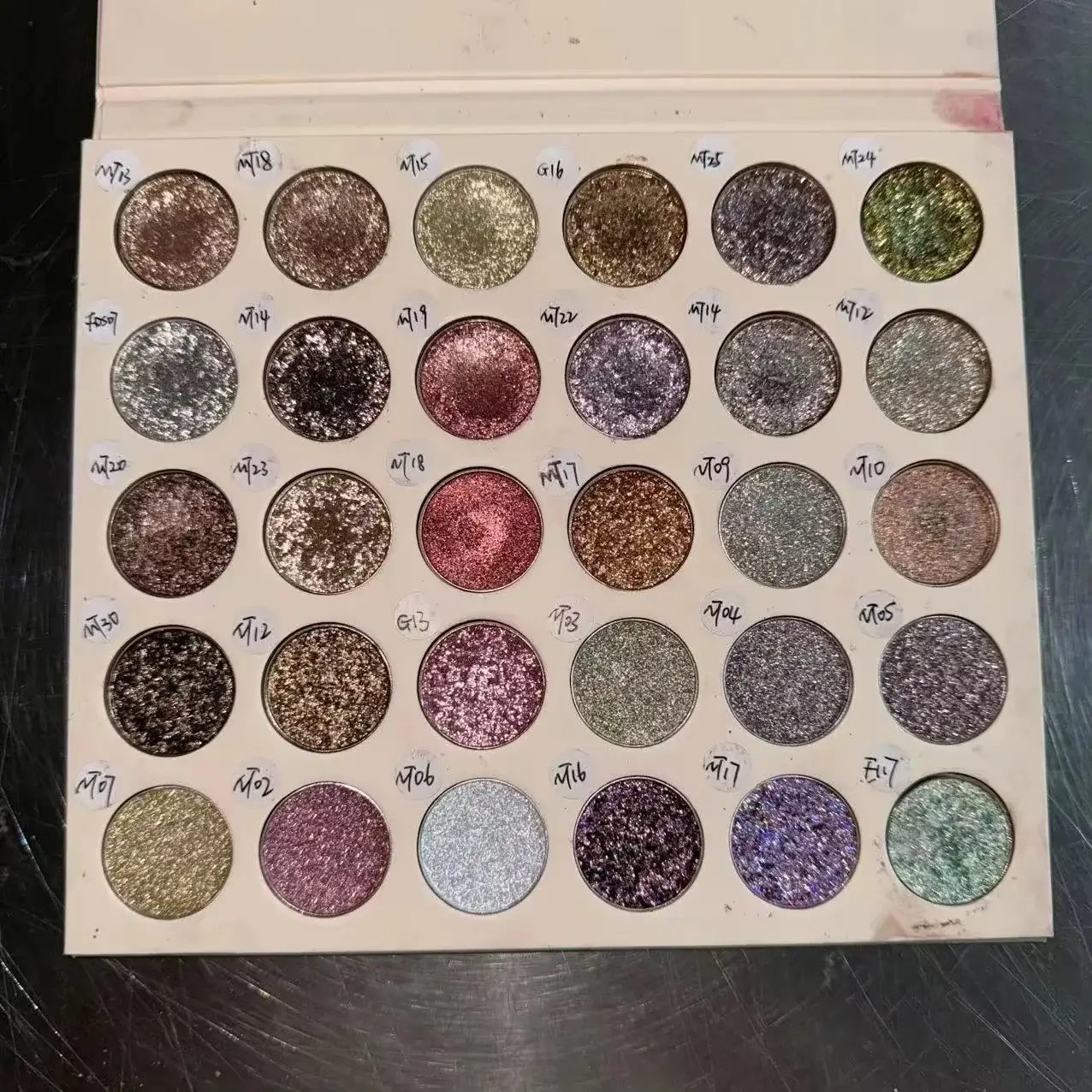 Sparkle metallic eyeshadow swatches with silver-reflective shine